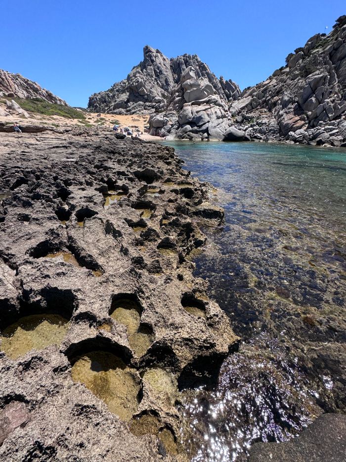 Clear water in a rocky cove in Sardinia